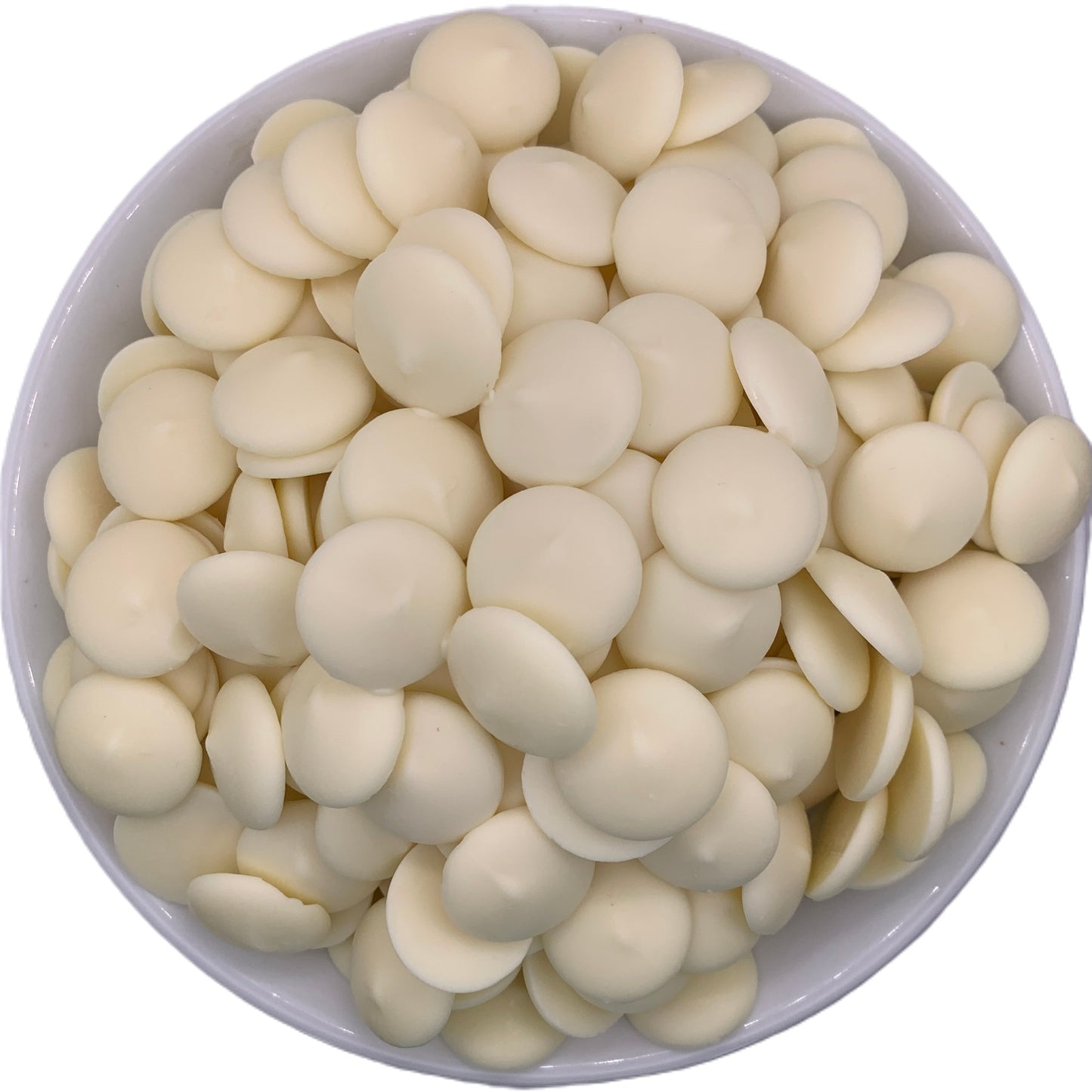 Direct overhead shot of a bowl of Merckens white chocolate melting wafers, displaying the neatly stacked white discs ready for gourmet chocolate making.