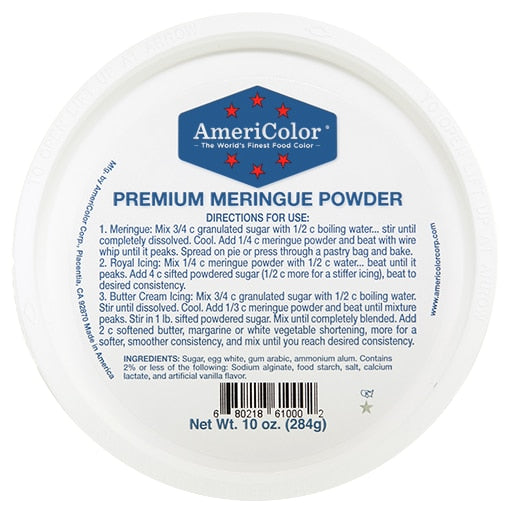 Round white 10 oz tub of AmeriColor Premium Meringue Powder with blue hexagon logo and directions on the lid; labeled for royal icing, meringue, and buttercream; kosher and allergen-friendly.