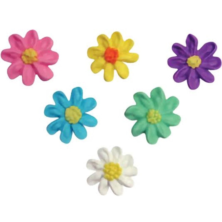 A collection of six royal icing daisy decorations in varying colors, displayed against a white background. Each flower has a unique color combination with a central bulb and petal details, presenting an array of pink, yellow, purple, blue, green, and white. These edible decorations are commonly used in cake and cupcake adornment