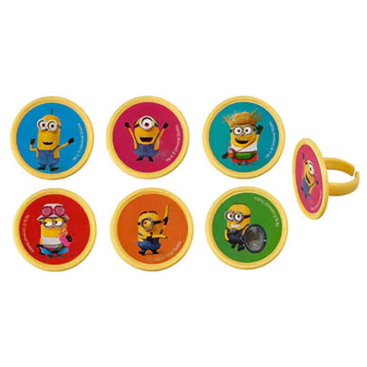 Colorful assortment of cupcake topper rings each featuring different minion characters, presented in a mix of bright primary colors that stand out against a yellow background.