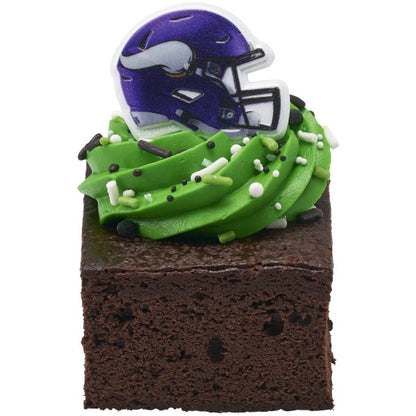 Chocolate brownie topped with green frosting and a Minnesota Vikings helmet ring.