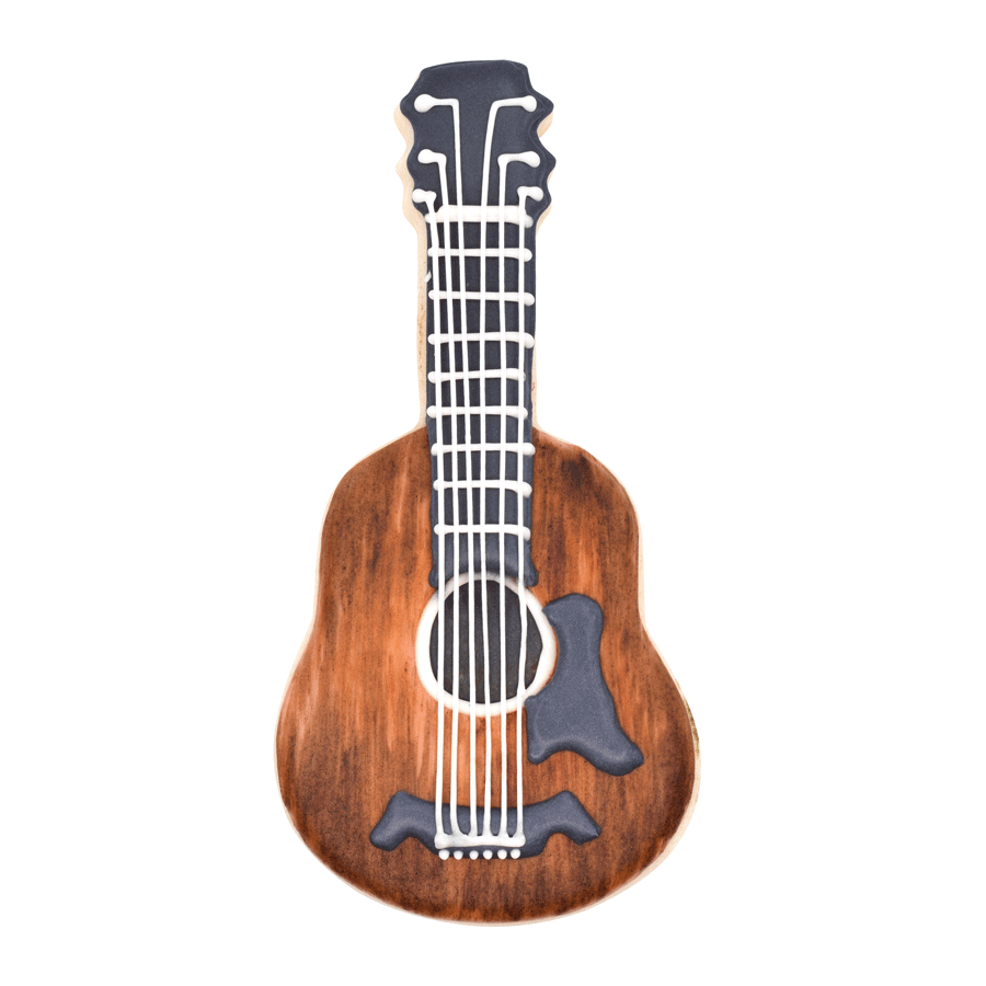 A decorated guitar-shaped cookie with a brown woodgrain effect, black accents, and white icing details for strings and frets.