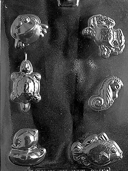 N052 FIZZIE NAUTICAL ASST. chocolate mold with several small anchor and shell-style cavities sized for bite-size candies.