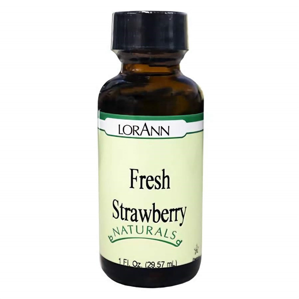 1 oz amber glass bottle of LorAnn Natural Fresh Strawberry Flavor with a pale green label and black cap. Labeled “Fresh Strawberry” and part of the Naturals product line.
