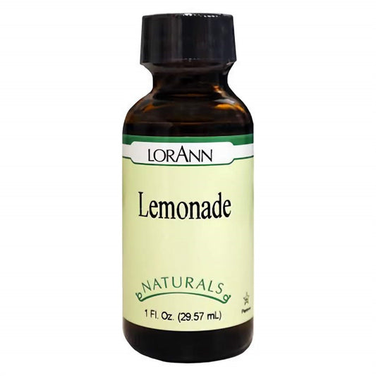 1 oz amber bottle of LorAnn Natural Lemonade Flavor with black cap and pale yellow label reading “Lemonade” and “Naturals.” Ideal for citrus-flavored baking and candy applications.
