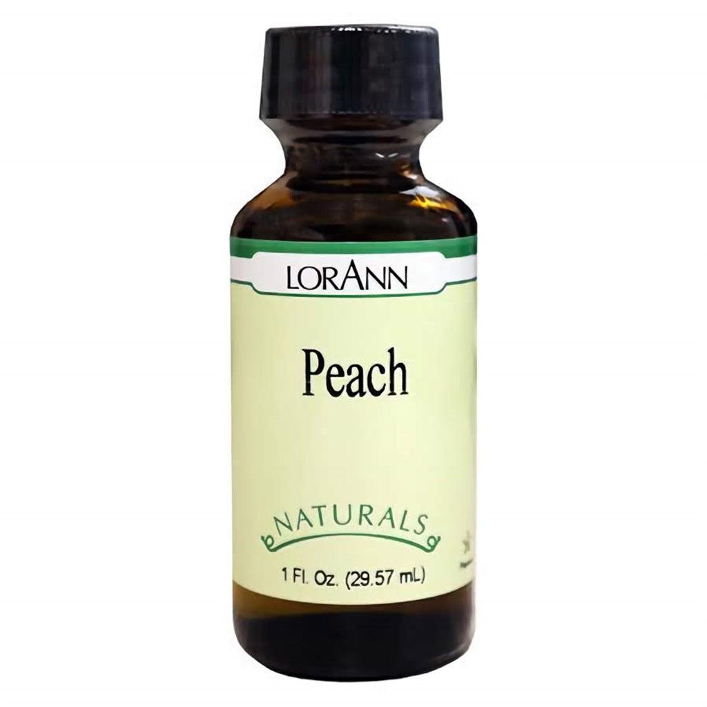Amber glass bottle of LorAnn Natural Peach Flavor with black cap and cream-colored label marked “Peach” and “Naturals.” 1 oz bottle designed for baking and candy applications.