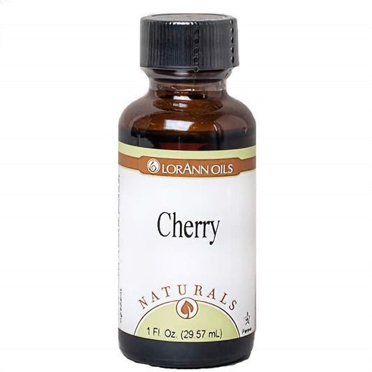 1 fl oz bottle of LorAnn Oils Naturals Cherry Flavor, with luscious red cherries in the foreground, alluding to a deep and sweet cherry aroma.
