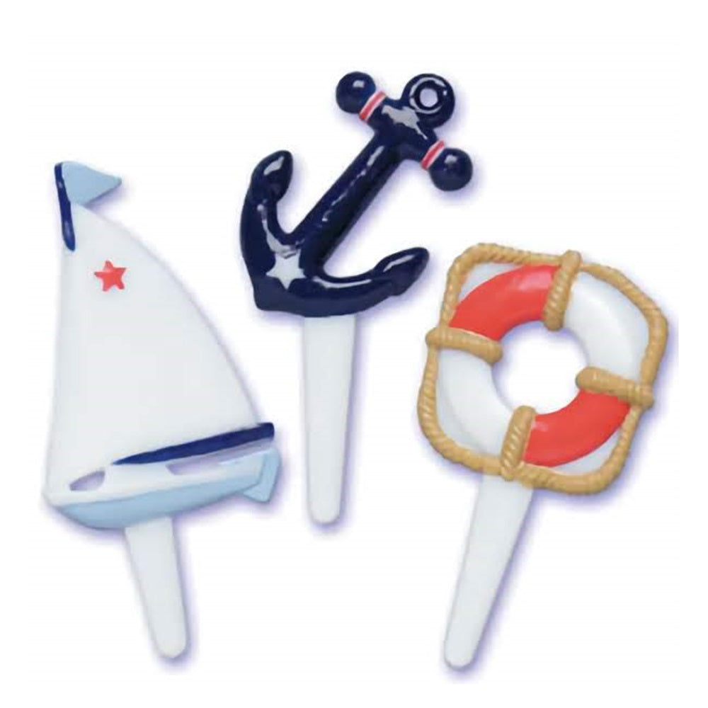 Set of nautical cupcake topper picks, featuring a classic white sailboat with a red star, a dark blue anchor, and a lifebuoy with red and white stripes, ideal for maritime-themed parties or celebrations by the sea.