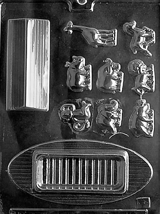 Clear plastic chocolate mold sheet featuring multiple small animal figure cavities and rectangular detail pieces, designed to decorate and build a Noah’s Ark chocolate scene.