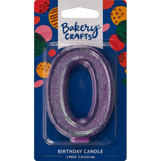 Glittery purple number zero 3" birthday candle in packaging from Bakery Crafts.