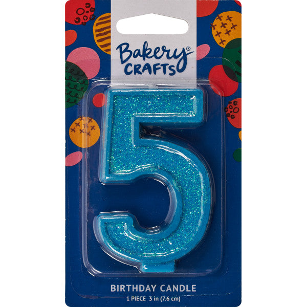 Glittery blue number five 3" birthday candle in packaging from Bakery Crafts.