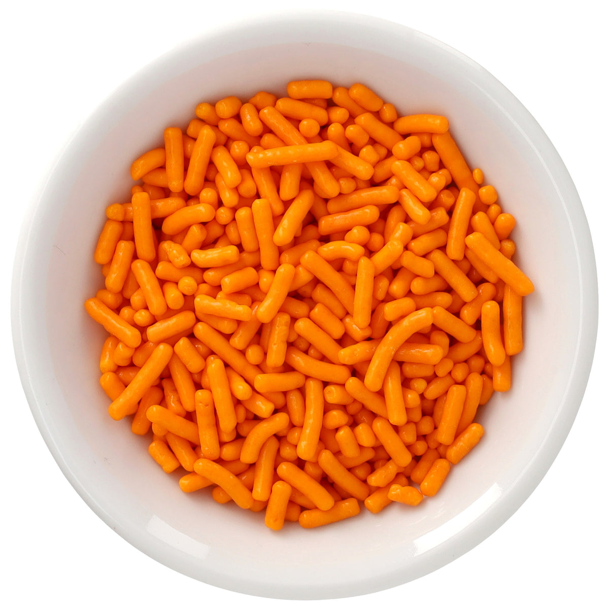 White bowl filled with bright citrus orange Natural Dyed Made Simply™ rod-shaped sprinkles, photographed from above against a white background.