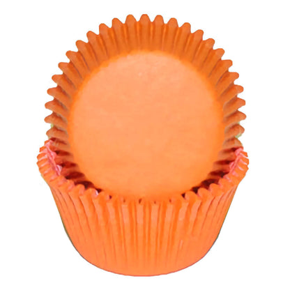 Orange standard greaseproof cupcake liners in a stack, showcasing their bold, vibrant orange color, ideal for autumn or Halloween-themed baking.