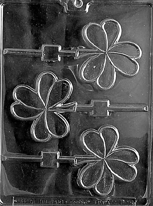 P018 SHAMROCK Lollipop chocolate mold with large lollipop cavities shaped like shamrocks.