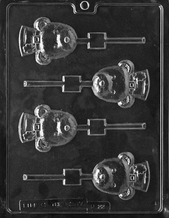 P022 SHAMROCK BEAR Lollipop chocolate mold with lollipop cavities shaped like bears holding shamrocks.