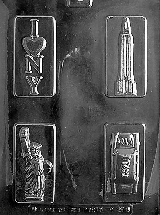 P027 NY THEME BOX SET chocolate mold with multiple cavities featuring New York-themed designs.