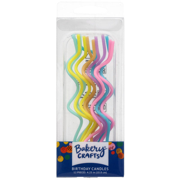 Clear Bakery Crafts package holding assorted pastel twist shaped birthday candles in mint, yellow, peach, lavender, pink, and blue, each candle formed in a wavy spiral shape.