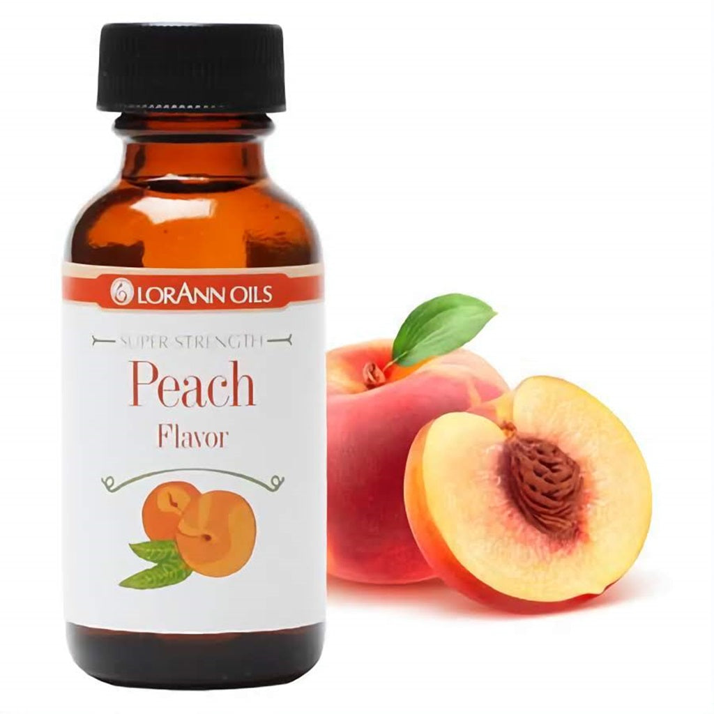 LorAnn Super Strength Peach Flavor in a 1 fl oz bottle, paired with a luscious peach slice, reflecting the sweet and juicy profile of ripe peaches for gourmet creations.