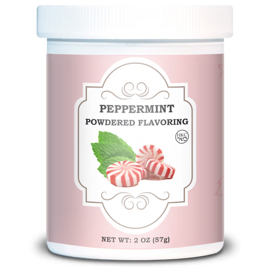 White 2 oz jar of Peppermint Powdered Flavoring with a pink label, peppermint candies, mint leaves, and a white screw-top lid