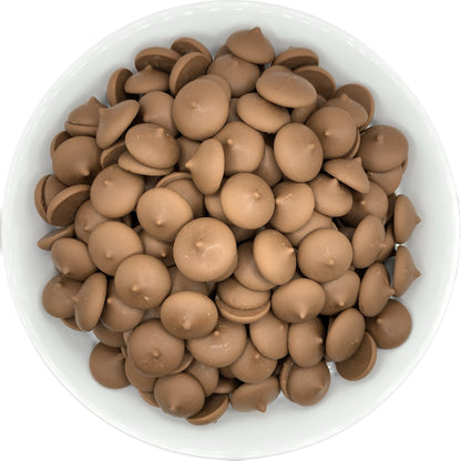 Peter's Westchester Milk Chocolate Confectionery Melting Wafers presented in a white bowl, exemplifying the classic, creamy milk chocolate appeal for candy making and dessert garnishing.