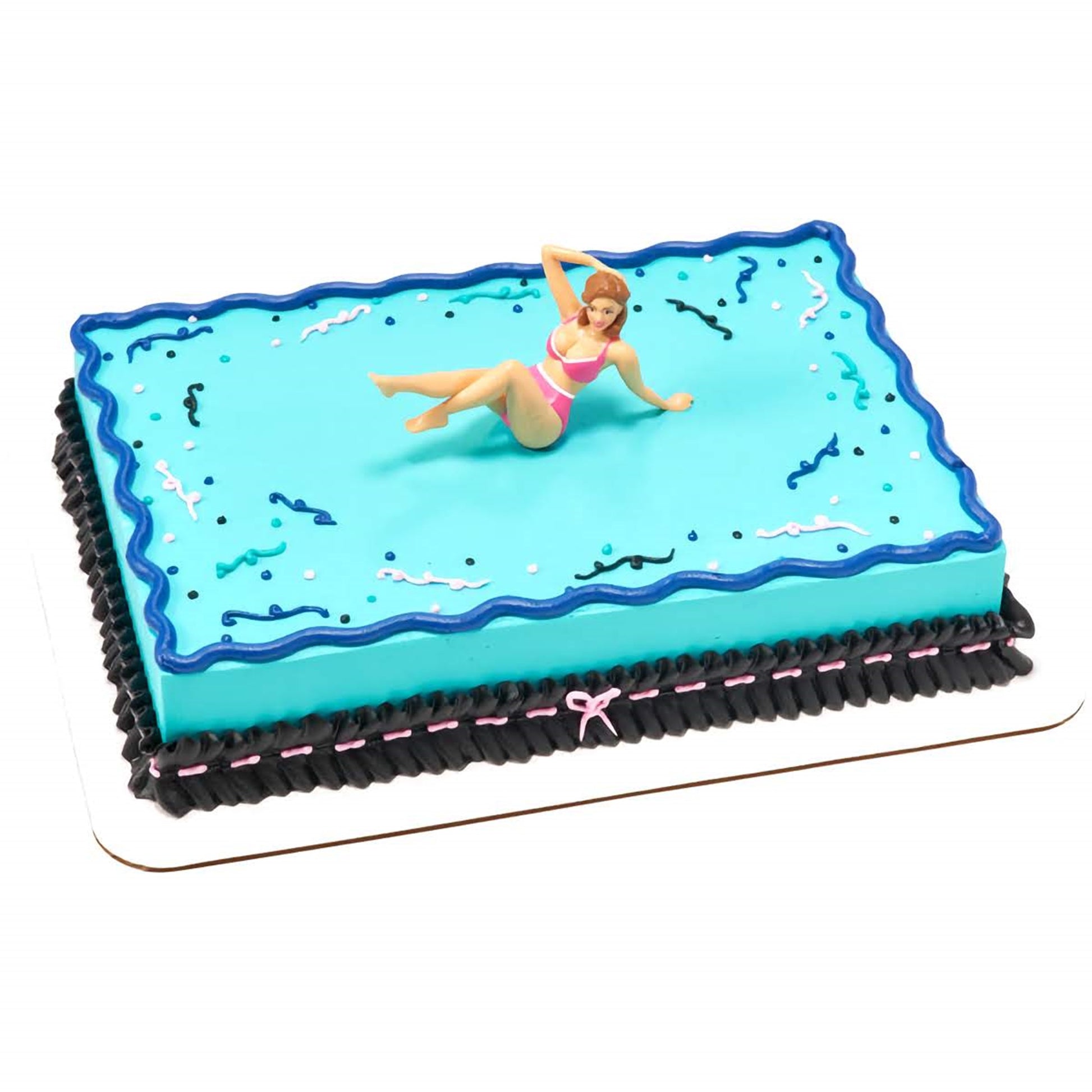 A cake featuring a figure of a woman in a pink bikini, reclining on a vivid turquoise icing with a wavy border design. This novelty cake from Lynn's Cake, Candy, and Chocolate Supplies is a fitting centerpiece for a beach party or a playful birthday celebration.