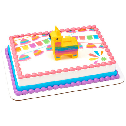 A fiesta-themed cake featuring the piñata topper, decorated with festive banners and colorful frosting.