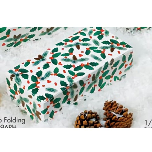 This image shows a 1/4 pound candy box with a pine cone and holly design, set against a snowy background that enhances the festive holiday theme. The box is surrounded by pinecones, adding to the seasonal charm.
