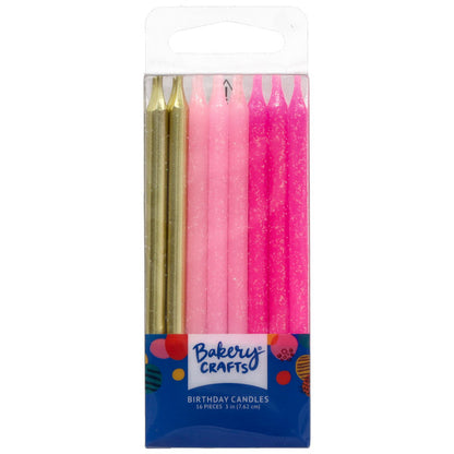 Clear retail package of Bakery Crafts birthday candles showing assorted metallic gold, light pink, and dark pink glitter candles arranged vertically with a blue label.