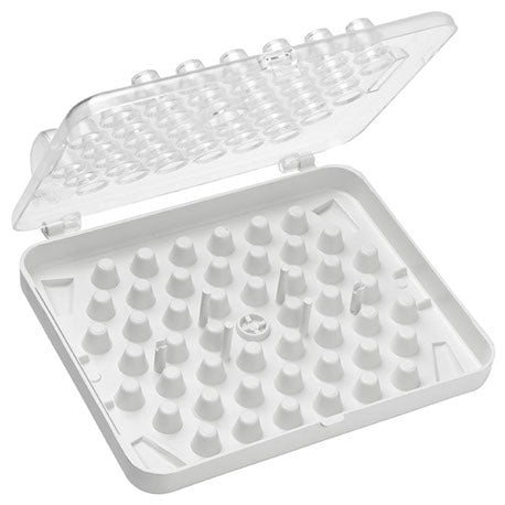 Open piping tip storage box with molded white interior featuring 52 slots for standard piping tips, plus designated space for a coupler and flower nails, and a clear lid