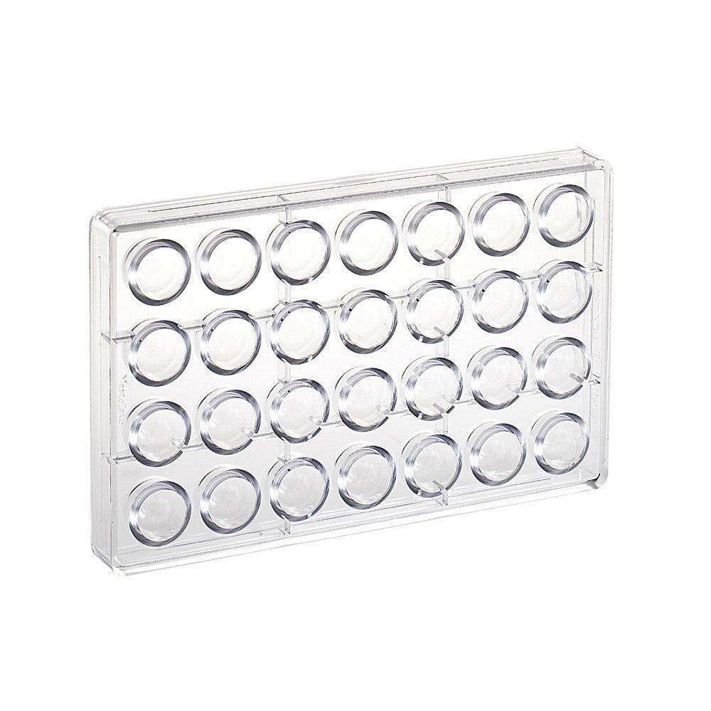 Clear polycarbonate chocolate mold with 28 round cavities arranged in rows, shown on a white background.