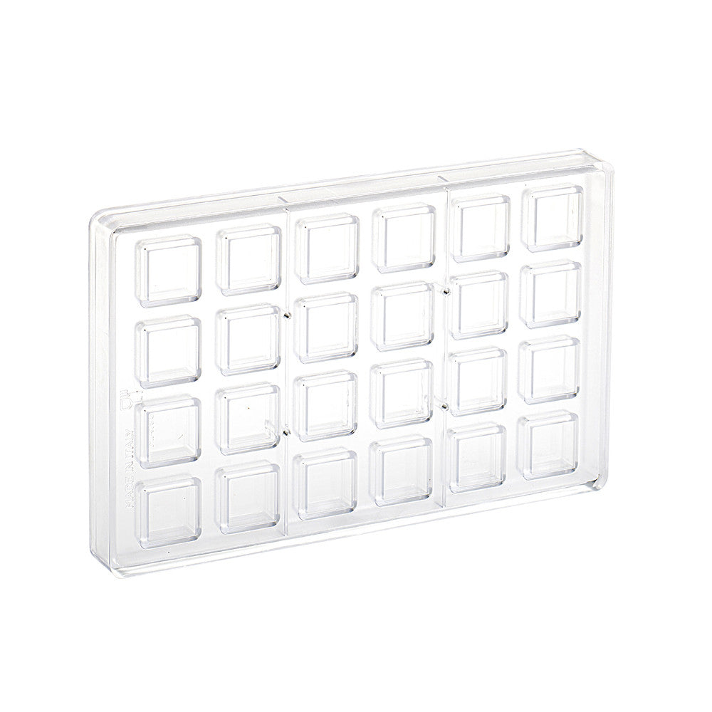 Clear polycarbonate chocolate mold with 24 small square cavities arranged in a grid, shown on a white background.
