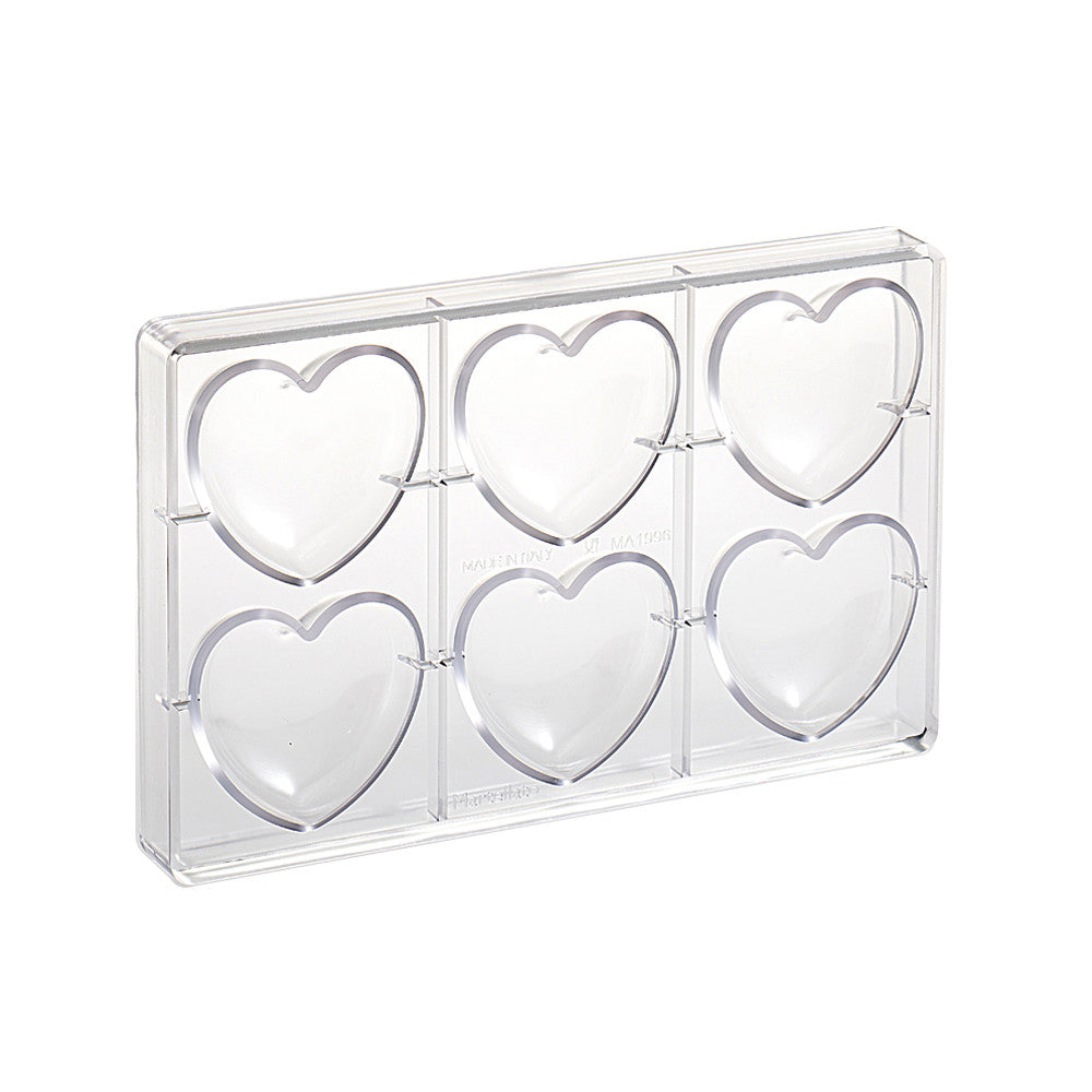 Clear polycarbonate chocolate mold with six large heart-shaped cavities arranged in two rows, shown on a white background.