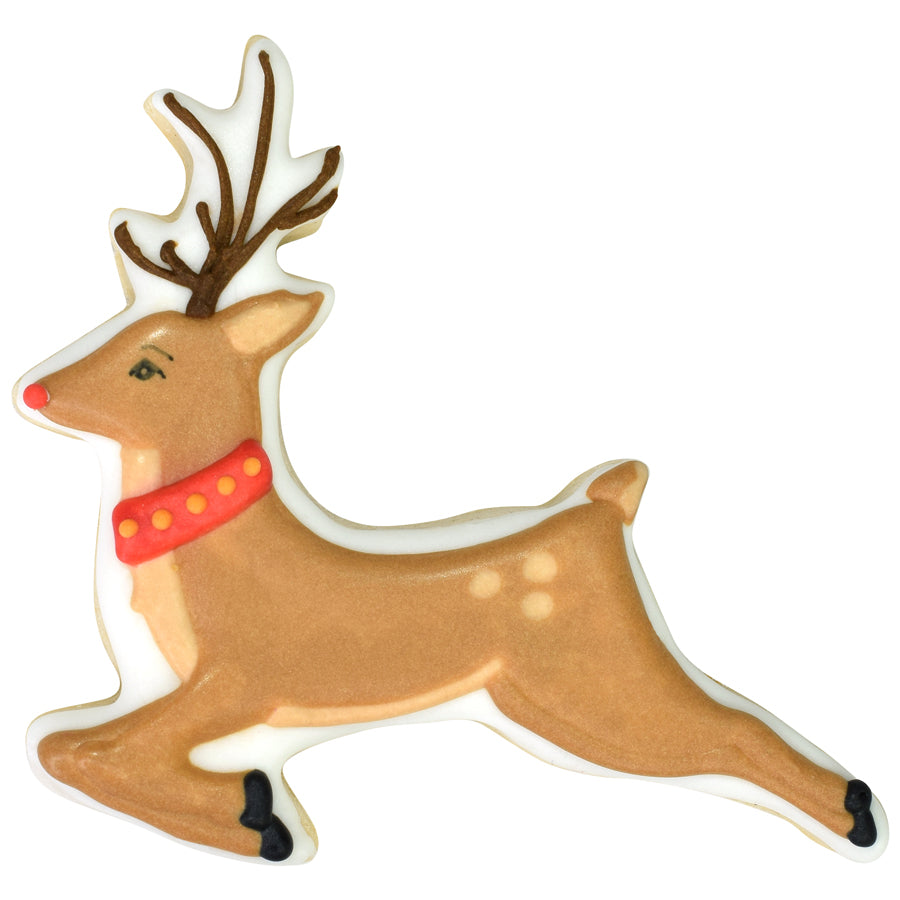 Decorated prancing reindeer cookie with brown icing, branching antlers, red collar, red nose, black hooves, and pale spotted details.