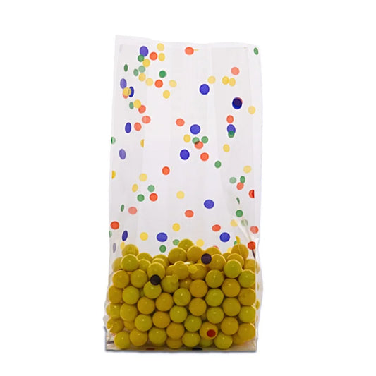Clear gusseted cello bag with multicolor confetti dot pattern, filled with yellow candy balls, perfect for party favors, birthdays, or retail treat packaging.