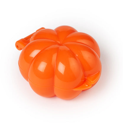 Closed pumpkin-shaped cake pop mold in bright orange plastic, featuring ridged design for realistic pumpkin shaping.