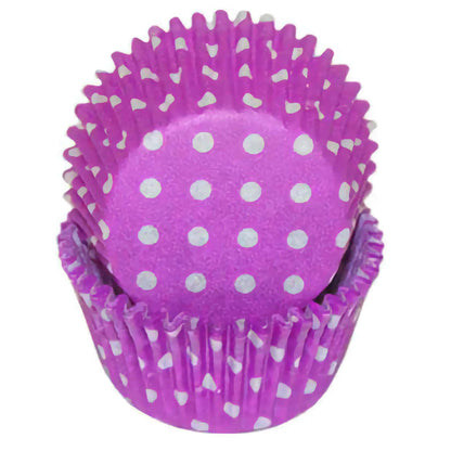 Purple cupcake baking cup with white polka dots, displayed in a nested stack.