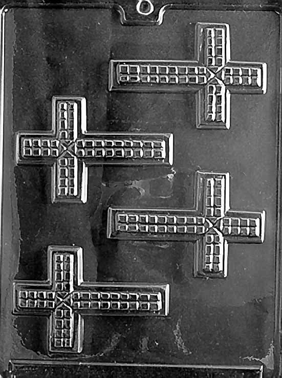 R010 FANCY CROSS chocolate mold with cross cavity featuring ornate edges and design.