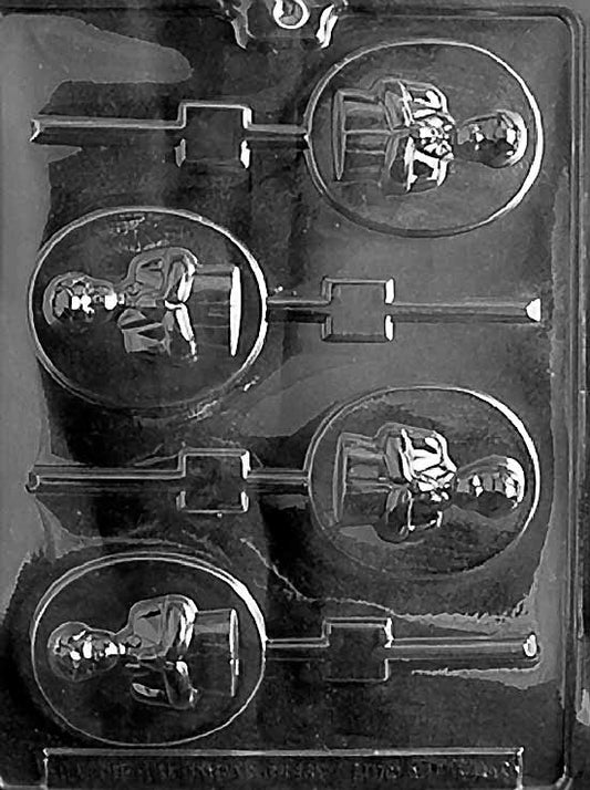 R046 BOY COMMUNION Lollipop chocolate mold with lollipop cavities embossed with boy communion imagery.