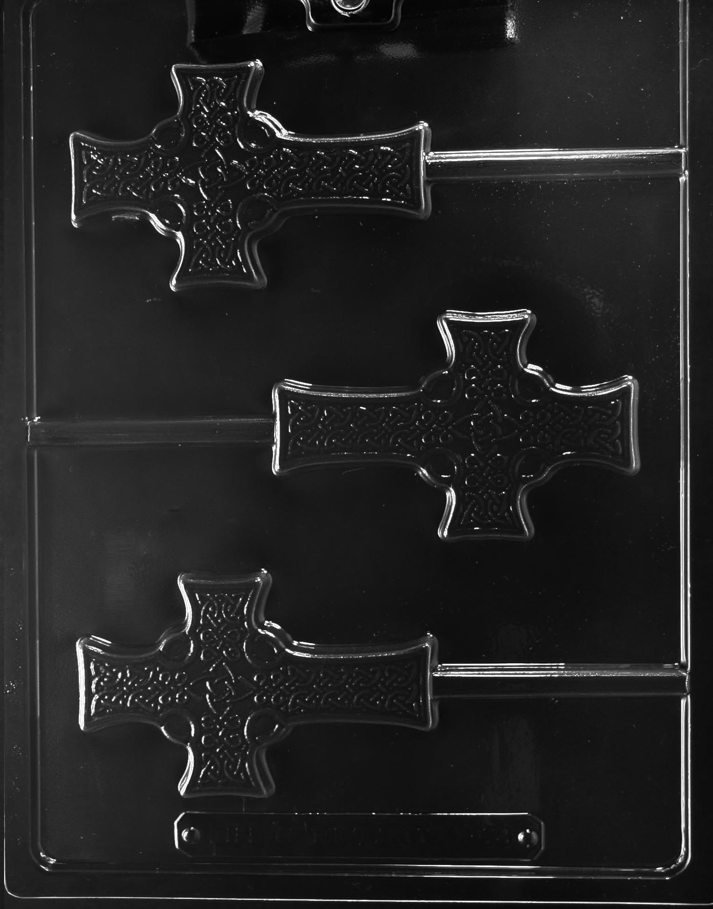 R074 CELTIC CROSS chocolate mold with cavity shaped like a Celtic cross featuring central circle and arms.