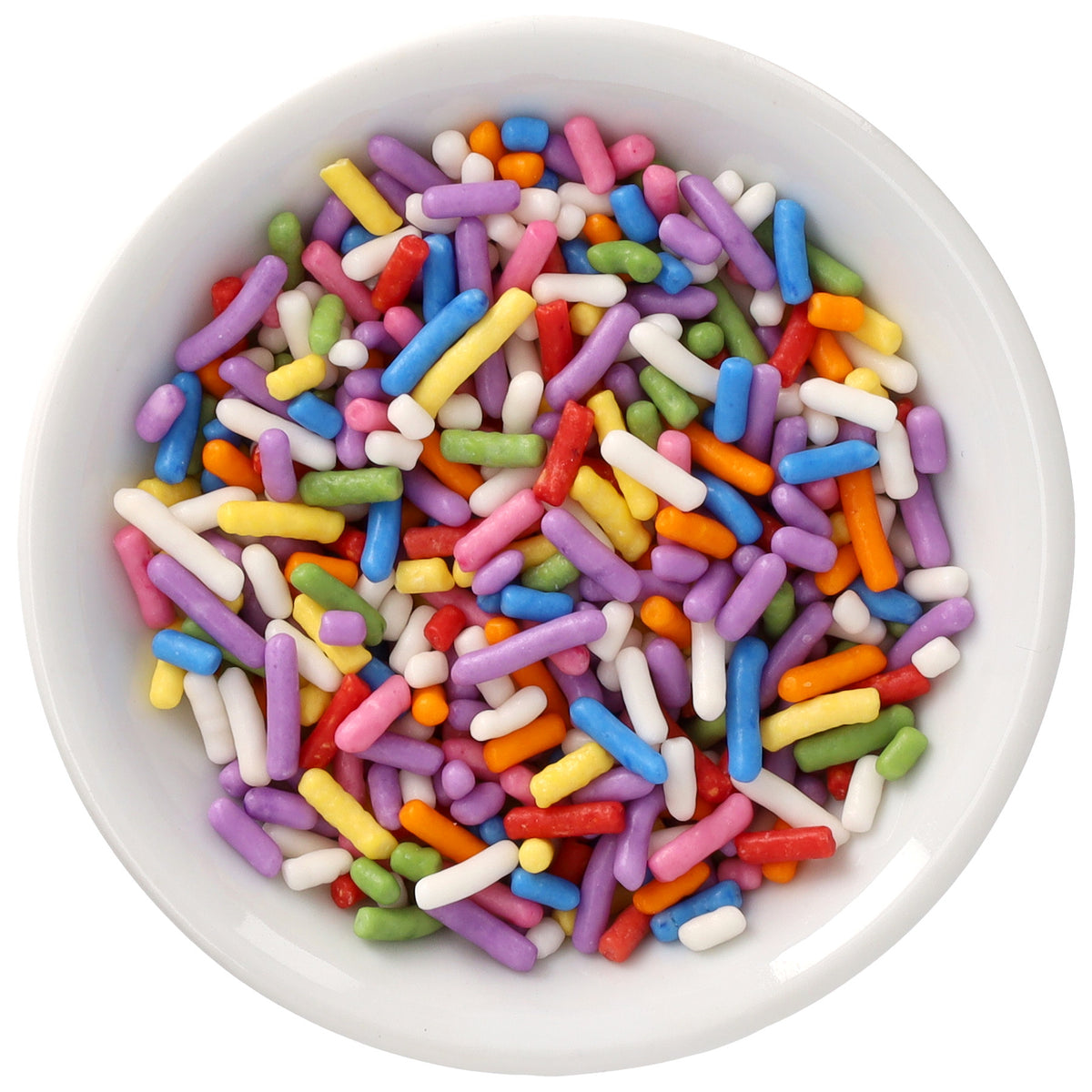 White bowl filled with Rainbow Natural Dyed Made Simply™ Sprinkles in pink, purple, blue, green, yellow, orange, red, and white.
