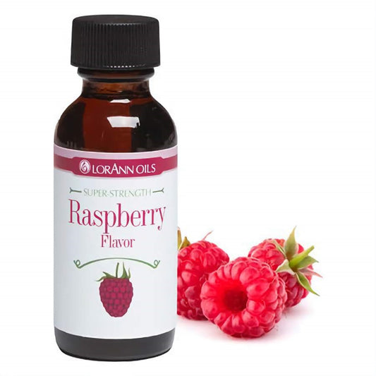 LorAnn Oils Super-Strength Raspberry Flavor in a brown bottle, set against fresh raspberries, suggesting the flavor's potential to infuse baked goods with berry sweetness.
