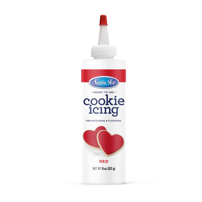 Satin Ice Ready-to-Use Red Cookie Icing in an 8 oz bottle with a precision nozzle, featuring a bright red label and decorated heart-shaped cookies.