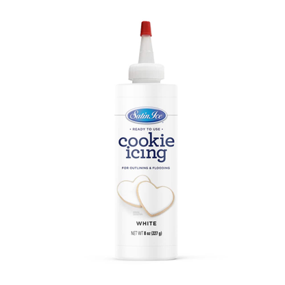 Satin Ice Ready-to-Use White Cookie Icing in an 8 oz bottle with a precision nozzle, featuring a bright white label and decorated heart-shaped cookies.