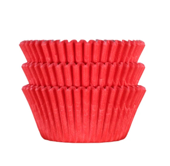 Stack of red jumbo cupcake liners, perfect for Texas-size cupcakes and muffins in bakeries, catering, and home baking.