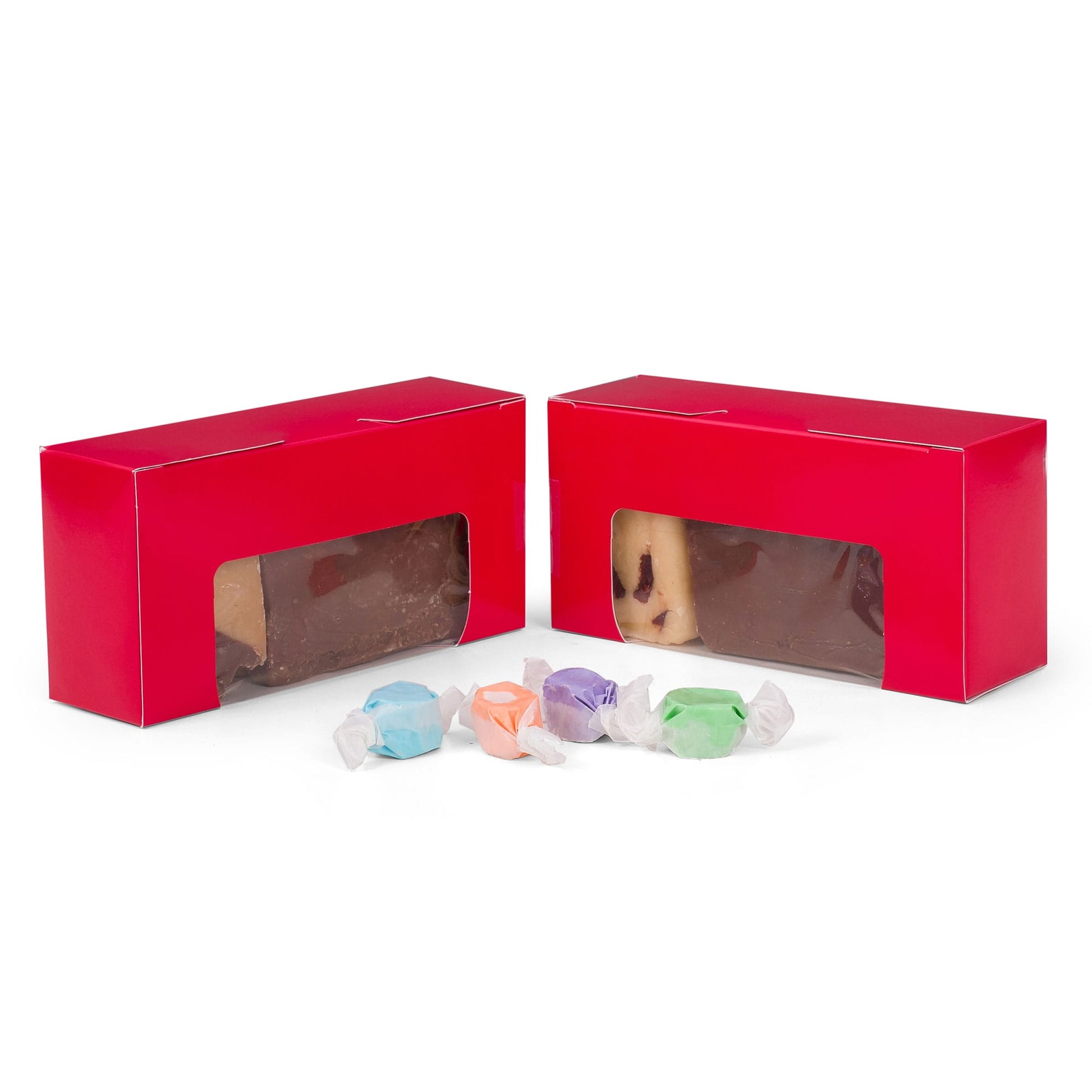 Red 1 lb candy box with clear window, showcasing fudge, ideal for packaging truffles, chocolates, and other sweets.