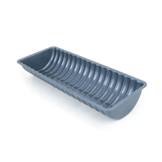 Rehrücken loaf pan with ribbed interior and non-stick coating, designed for baking traditional Austrian almond cakes.