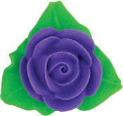 Purple royal icing rose cake decoration with detailed spiral petals and three vivid green leaves, isolated on a white background.