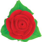 Red royal icing rose cake decoration with textured layered petals and three green leaves, isolated on a white background.
