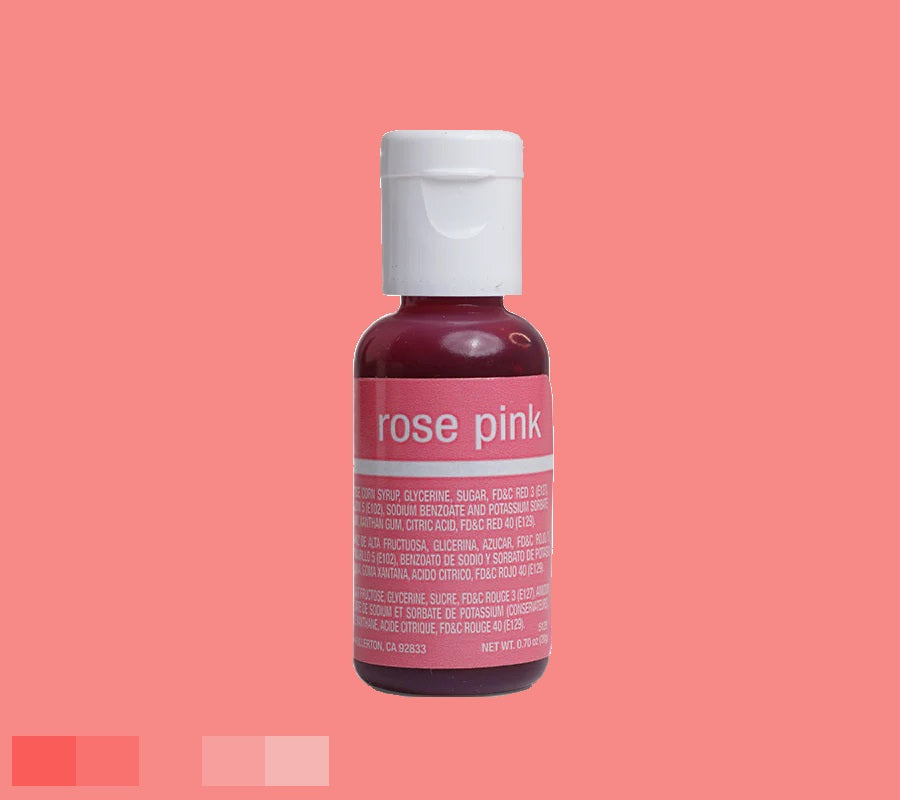 Soft rose pink Chefmaster edible dye, 0.70 oz, suitable for pastries and icing, in a clear bottle with white cap, on a pink background.