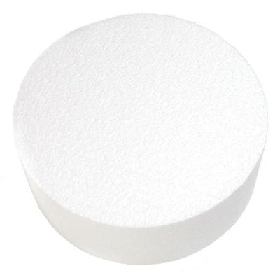 White round cake dummy made of solid Styrofoam, shown as a smooth cylinder with a slightly textured top surface on a white background.